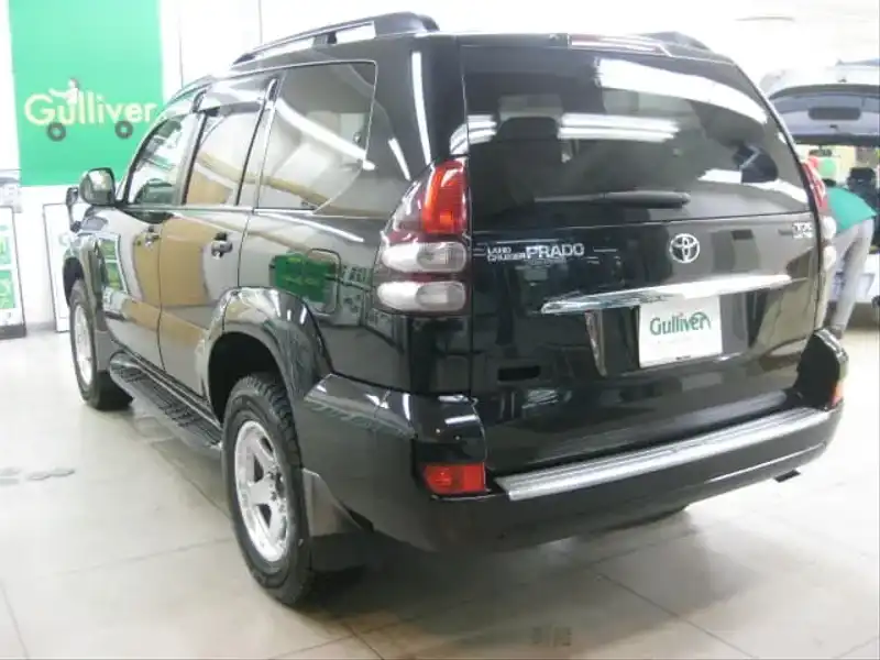 カタログ画像：ランドクルーザープラド（LAND CRUISER PRADO） ＴＸリミテッド 2008年8月 CBA-TRJ120W 2700cc ブラック 燃費8.8km / l  バック