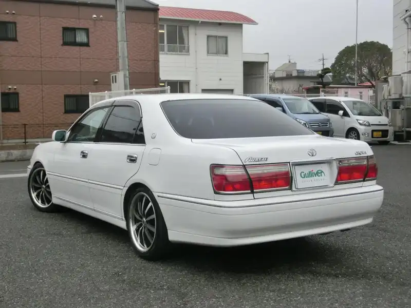 カタログ画像：クラウン（CROWN） アスリートＦｏｕｒ プレミアムスポーツセレクション 2000年8月 TA-JZS173 2500cc スーパーホワイトII 燃費9.2km / l  バック