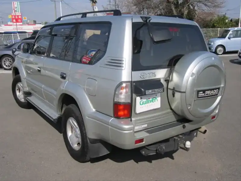 カタログ画像：ランドクルーザープラド（LAND CRUISER PRADO） ＴＸリミテッド 1999年6月 KH-KZJ95W 3000cc シルバーメタリック 燃費9.3km / l  バック