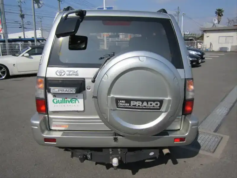 カタログ画像：ランドクルーザープラド（LAND CRUISER PRADO） ＴＸリミテッド 1999年6月 KH-KZJ95W 3000cc シルバーメタリック 燃費9.3km / l  バック