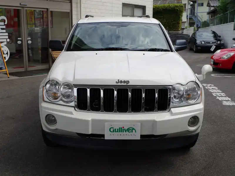 カタログ画像：ジープ・グランドチェロキー（JEEP GRAND CHEROKEE） リミテッド５．７ 2005年7月 GH-WH57 5700cc ストーンホワイトクリアコート 燃費5.7km / l  フロント