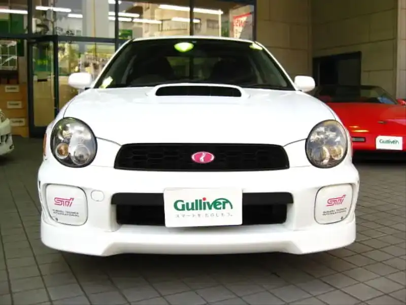 カタログ画像：インプレッサＷＲＸ（IMPREZA WRX） ＳＴｉタイプＲＡ［１６インチタイヤ仕様車］ 2000年10月 GH-GDB 2000cc ピュアホワイト 燃費10.4km / l  フロント