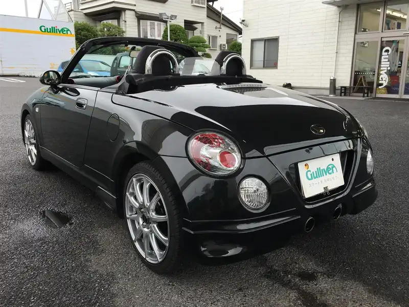 カタログ画像：コペン（COPEN） １０ｔｈアニバーサリーエディション 2012年4月 ABA-L880K 660cc ＤＣ・ブラックマイカメタリック 燃費15.2km / l  バック