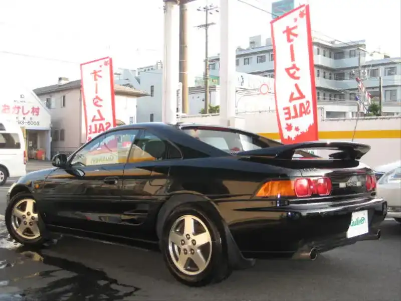 カタログ画像：ＭＲ２（MR2） ＧＴ－Ｓ Ｔバールーフ仕様車 1996年6月 E-SW20 2000cc ブラック 燃費10.6km / l  バック