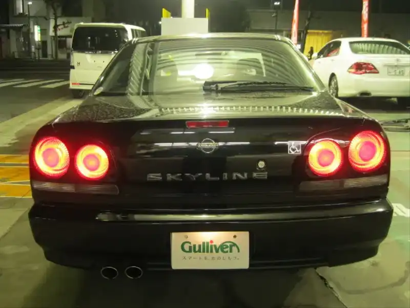 カタログ画像：スカイライン（SKYLINE） ２５ＧＴ－Ｘ 1998年5月 GF-ER34 2500cc ブラックパール 燃費10.6km / l  バック