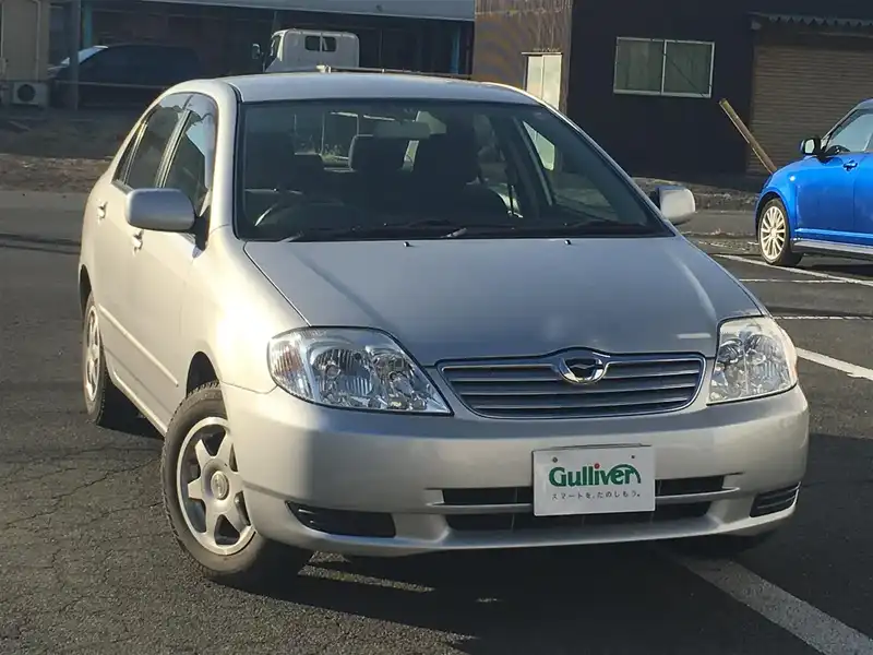 カタログ画像：カローラ（COROLLA） Ｇ Ｌパッケージ 2003年9月 UA-NZE124 1500cc シルバーマイカメタリック 燃費14.4km / l  メイン（その他）