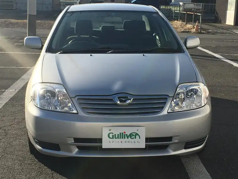 カタログ画像：カローラ（COROLLA） Ｇ Ｌパッケージ 2004年2月 CBA-NZE124 1500cc シルバーマイカメタリック 燃費14.4km / l  フロント