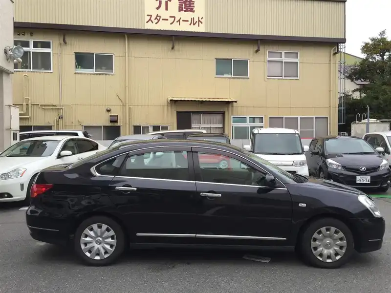 カタログ画像：ブルーバードシルフィ（BLUEBIRD SYLPHY） １５Ｓ 2005年12月 DBA-G11 1500cc サファイアブラック（Ｐ） 燃費16.6km / l  外装