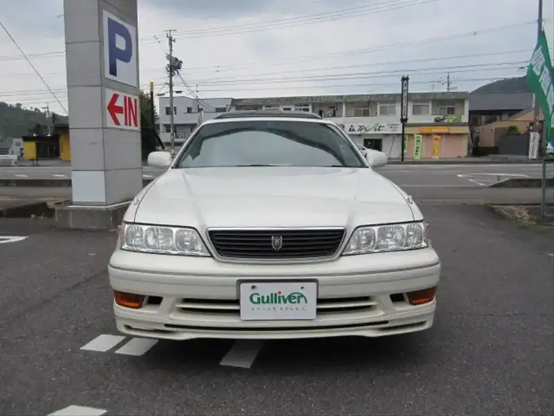 カタログ画像：マークII（MARK II） ツアラーＶ 1997年8月 E-JZX100 2500cc ホワイトパールマイカ 燃費10.2km / l  フロント