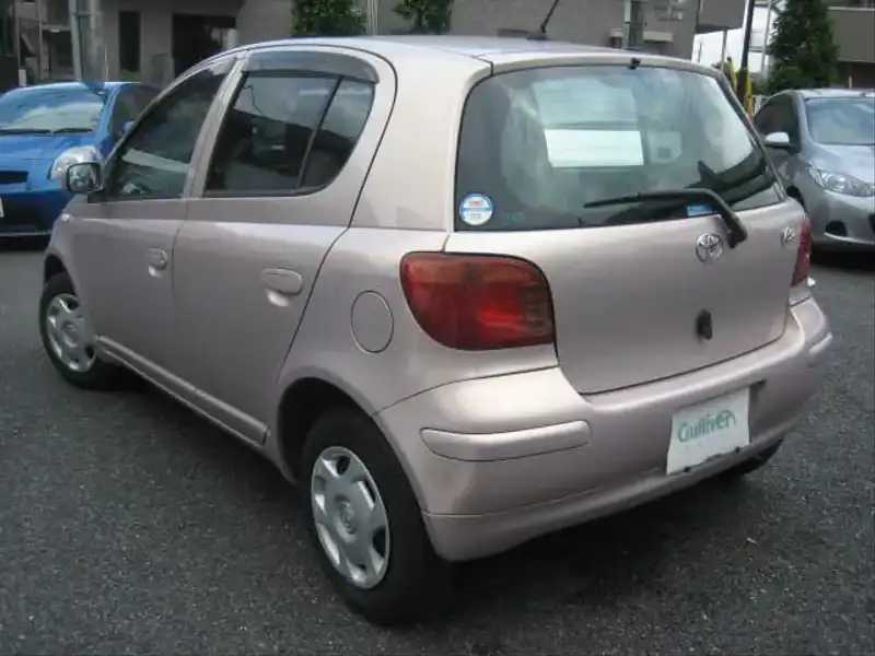 カタログ画像：ヴィッツ（VITZ） Ｕ Ｌパッケージ ナビスペシャル 2002年12月 UA-SCP13 1300cc ペールローズメタリックオパール 燃費23.5km / l  バック