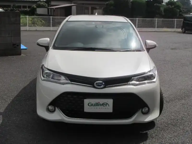 カタログ画像：カローラフィールダー（COROLLA FIELDER） ハイブリッドＧ ダブルバイビー 2015年4月 DAA-NKE165G 1500cc ホワイトパールクリスタルシャイン 燃費33.8km / l フロント