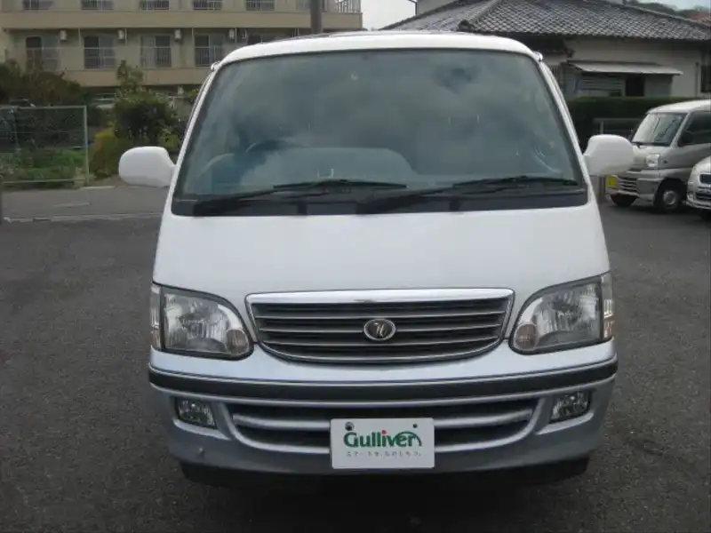 カタログ画像：ハイエースワゴン（HIACE WAGON） スーパーカスタムＧ ミドルルーフ（トリプルムーンルーフ） 2004年4月 KH-KZH100G 3000cc アクアシルバートーニング 燃費9.5km / l  フロント