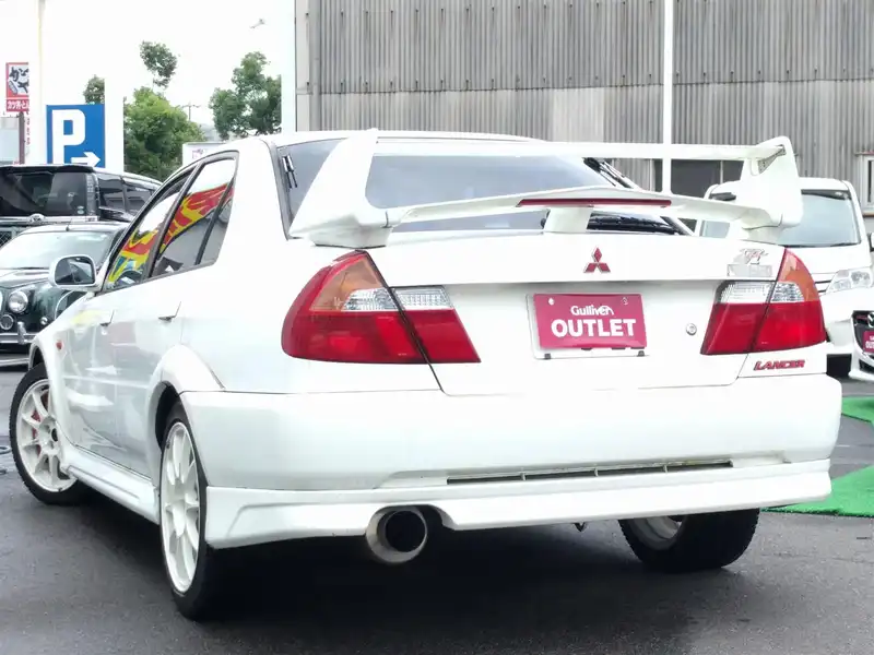 カタログ画像：ランサー（LANCER） ＲＳエボリューションⅥ トミー・マキネンエディション 2000年1月 GF-CP9A 2000cc スコーティアホワイト（ソリッド） バック