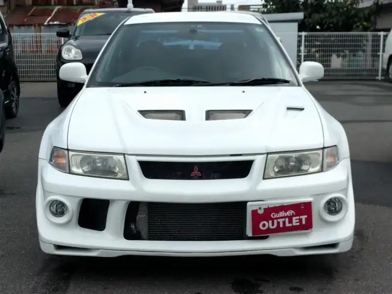 カタログ画像：ランサー（LANCER） ＲＳエボリューションⅥ トミー・マキネンエディション 2000年1月 GF-CP9A 2000cc スコーティアホワイト（ソリッド） フロント