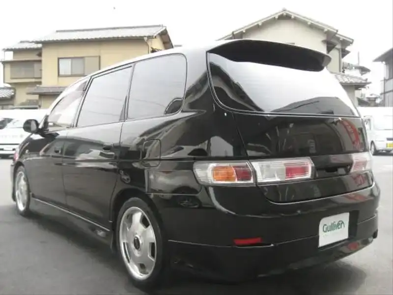 カタログ画像：ガイア（GAIA） ガイア Ｌパッケージ 1998年5月 GF-SXM10G 2000cc ブラック 燃費11.6km / l  バック