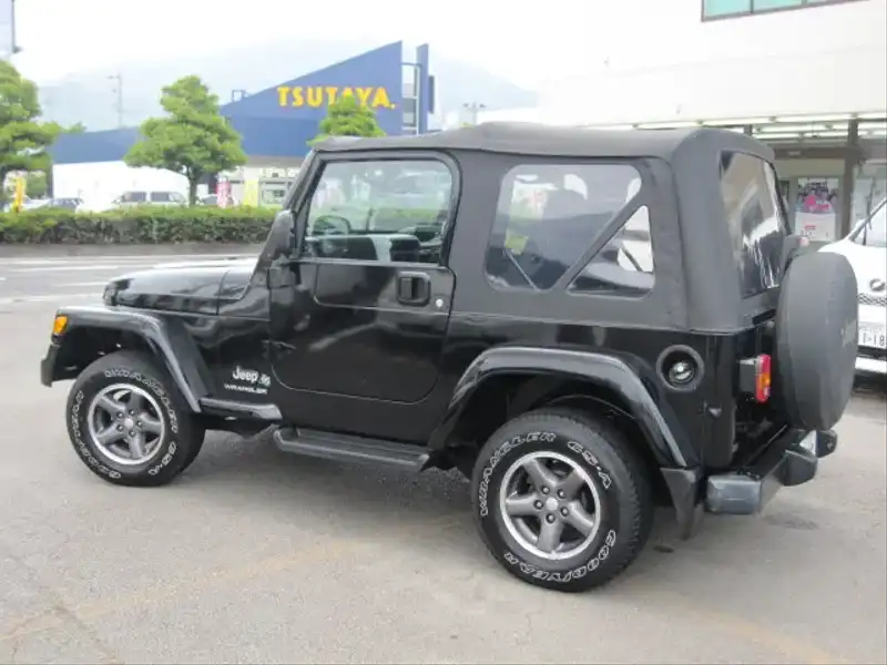 10034283 | カタログ画像：ジープ・ラングラー（JEEP WRANGLER） ６５アニバーサリーエディション 2006年6月 GH-TJ40S 4000cc ブラッククリアコート 外装