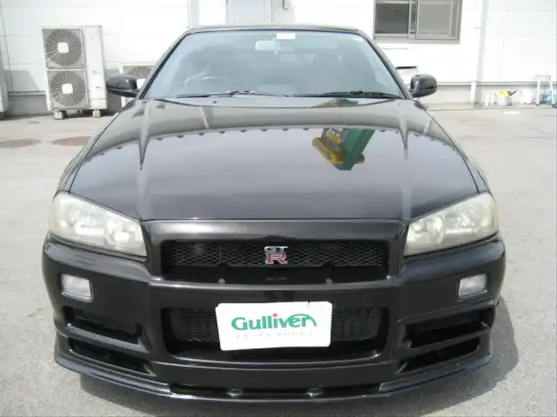 カタログ画像：スカイライン（SKYLINE） ＧＴ－Ｒ Ｖスペック 1999年1月 GF-BNR34 2600cc ブラックパール 燃費8.1km / l  フロント