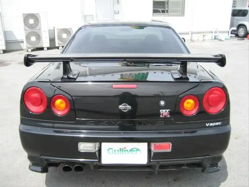 カタログ画像：スカイライン（SKYLINE） ＧＴ－Ｒ 1999年1月 GF-BNR34 2600cc ブラックパール 燃費8.1km / l  バック