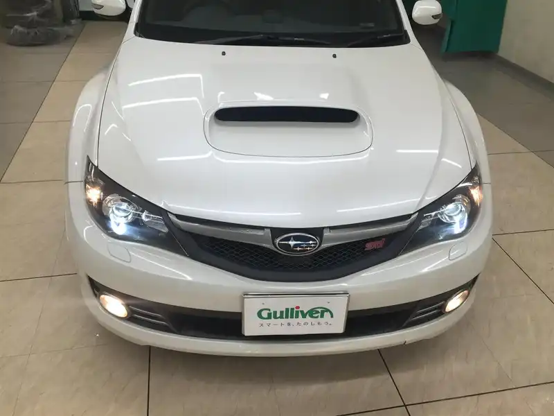 カタログ画像：インプレッサ（IMPREZA） ＷＲＸ ＳＴＩ Ａライン 2009年2月 CBA-GRF 2500cc サテンホワイト・パール 燃費10.0km / l  フロント