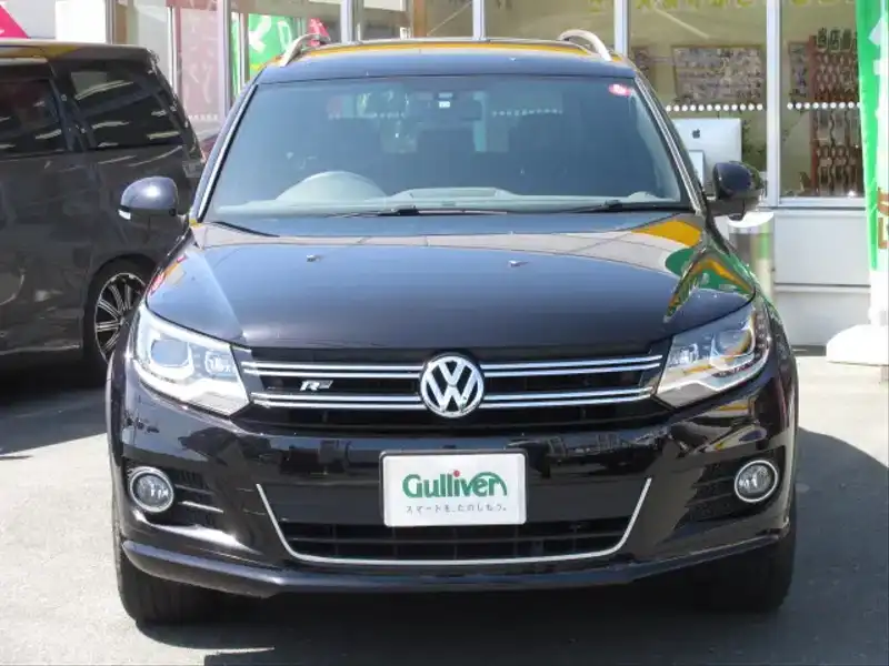 カタログ画像：ティグアン（TIGUAN） ＴＳＩ ブルーモーションテクノロジー Ｒラインパッケージ 2012年11月 DBA-5NCTH 1400cc ディープブラックパールエフェクト 燃費14.6km / l フロント