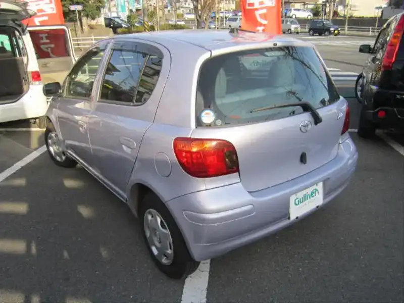 カタログ画像：ヴィッツ（VITZ） Ｕ Ｌパッケージ・ラベンダーエディション 2003年8月 UA-SCP13 1300cc ラベンダーメタリック 燃費23.5km / l  バック