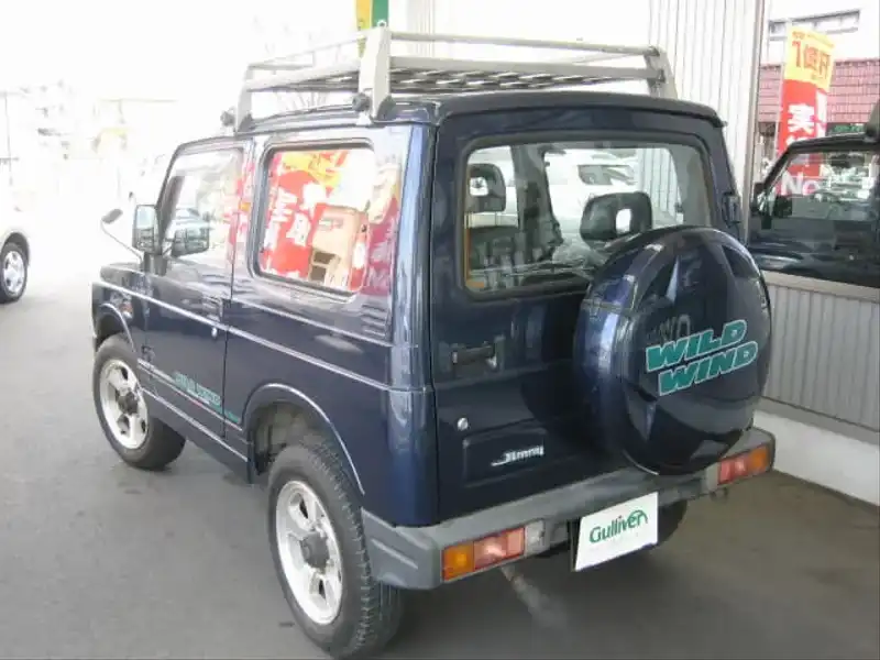 カタログ画像：ジムニー（JIMNY） ハードトップ ＸＣ 1995年11月 E-JA22W 660cc スキューバブルーメタリック 燃費15.8km / l  バック