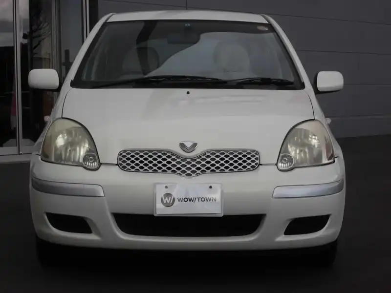 カタログ画像：ヴィッツ（VITZ） Ｕ Ｌパッケージ・ＮＥＯエディション 2004年5月 CBA-SCP13 1300cc ホワイトパールマイカ 燃費23.0km / l  フロント