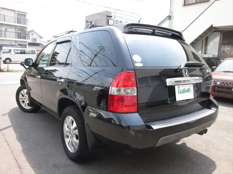 カタログ画像：ＭＤＸ（MDX） エクスクルーシブ 2003年3月 UA-YD1 3500cc ナイトホークブラック・パール 燃費7.8km / l  バック