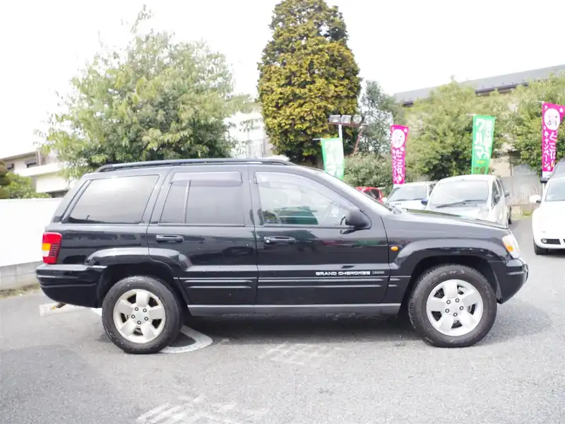 カタログ画像：ジープ・グランドチェロキー（JEEP GRAND CHEROKEE） ラレード 2003年6月 GH-WJ40 4000cc ブリリアントブラッククリスタルパールコート 燃費6.5km / l  外装