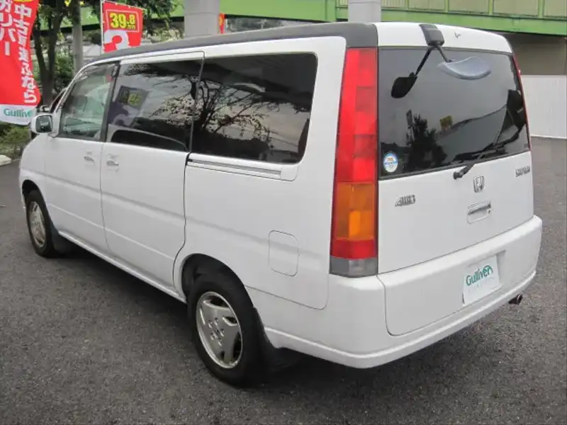 カタログ画像：ステップワゴン（STEPWAGON） Ｗ フィールドデッキ 回転対座シート 2000年8月 GF-RF2 2000cc タフタホワイト 燃費10.2km / l  バック