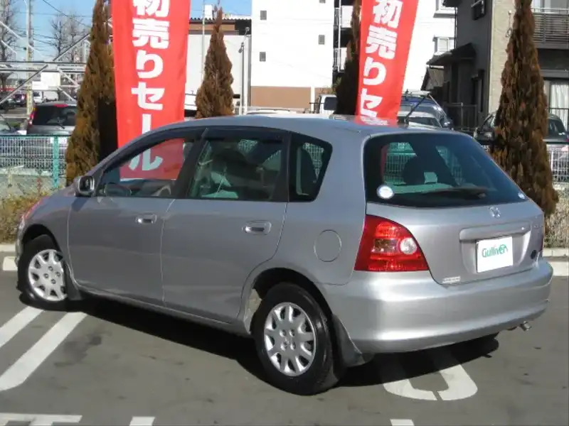 2003286 | カタログ画像：シビック（CIVIC） 日本カー・オブ・ザ・イヤー／ＲＪＣカーオブザイヤー受賞記念特別仕様車 2001年2月 LA-EU1 1500cc サテンシルバー・メタリック バック