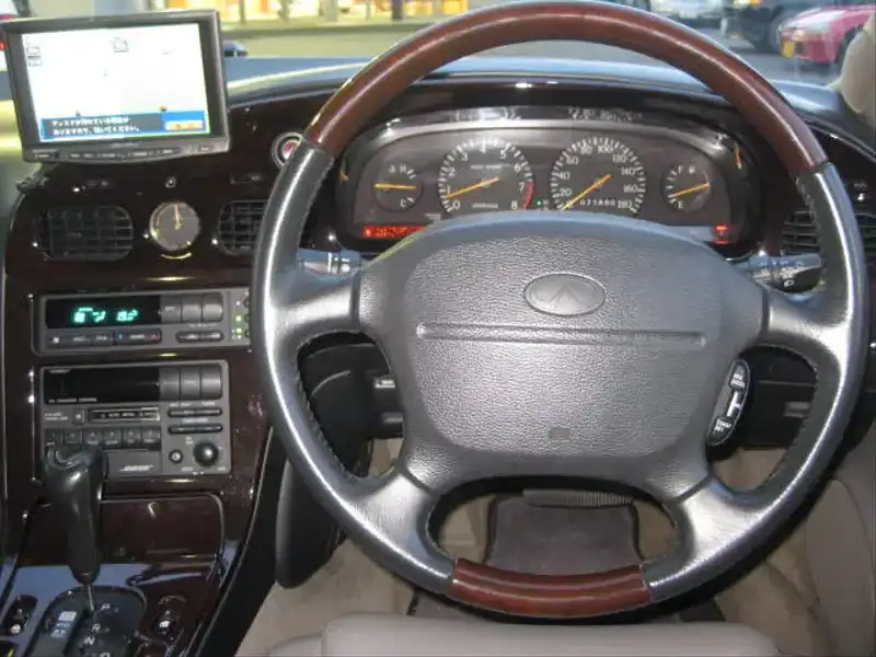 カタログ画像：インフィニティＱ４５（INFINITI Q45） タイプＶ 油圧アクティブサスペンション装着車 ＡＶシステム装着車 1994年10月 E-HG50 4500cc プラチナシルバー（Ｍ）（スーパーファインハードコート） 燃費6.4km / l  内装