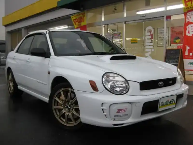 カタログ画像：インプレッサ（IMPREZA） ＷＲＸ ＳＴｉ スペックＣ １６インチタイヤ仕様車 2002年11月 GH-GDB 2000cc ピュアホワイト 燃費10.4km / l  メイン