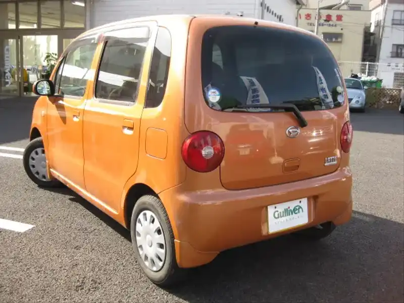 カタログ画像：ムーヴラテ（MOVE LATTE） Ｌ 2007年6月 DBA-L550S 660cc シャンパンメタリックオパールorアプリコットキャンディメタリック 燃費19.4km / l  バック