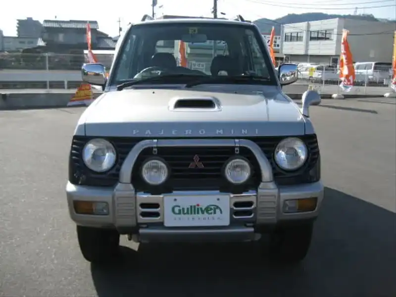 カタログ画像：パジェロミニ（PAJERO MINI） アニバーサリーリミテッド－Ｖ 1998年1月 E-H56A 660cc シンフォニックシルバー／ネアーズブルー／シンフォニックシルバー・３ウェイ２トーン フロント