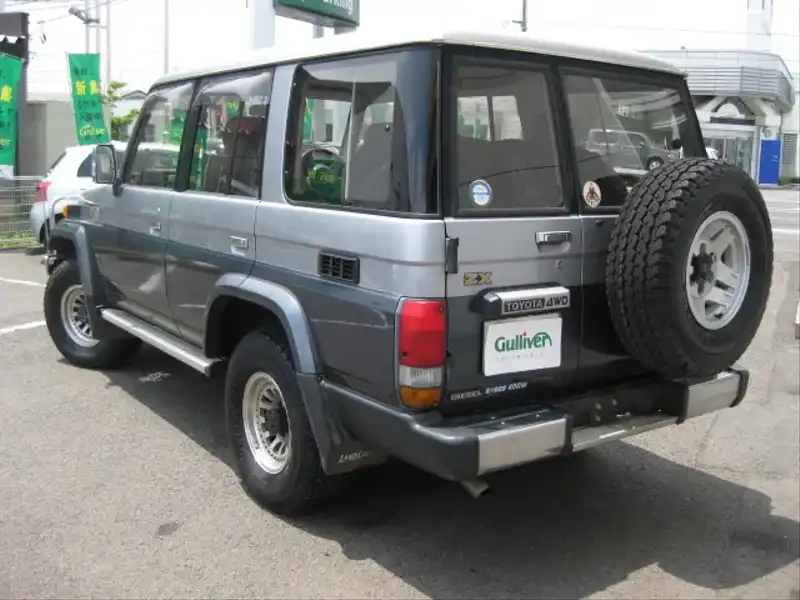 10001591 | カタログ画像：ランドクルーザー７０（LAND CRUISER 70） ＺＸ ４ドア 1990年4月 U-HZJ77HV 4200cc フィールドランナー・トーニング バック