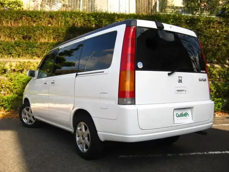 カタログ画像：ステップワゴン（STEPWAGON） デラクシー フィールドデッキ 回転対座シート 1999年5月 GF-RF1 2000cc タフタホワイト 燃費10.6km / l  外装