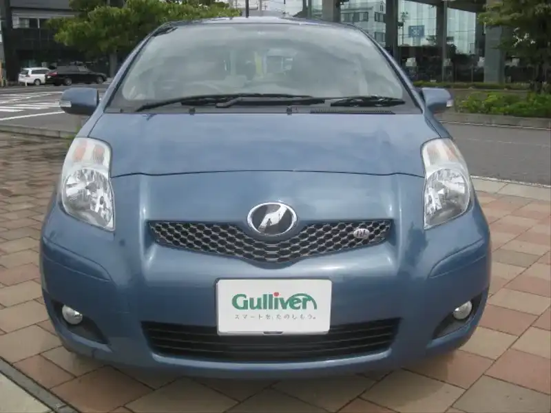 カタログ画像：ヴィッツ（VITZ） アイル 2009年8月 DBA-SCP90 1300cc グレイッシュブルーマイカメタリック 燃費20.0km / l  フロント