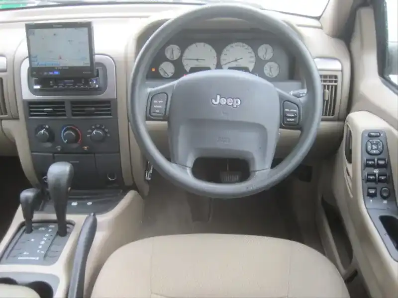 カタログ画像：ジープ・グランドチェロキー（JEEP GRAND CHEROKEE） ラレード 2003年6月 GH-WJ40 4000cc ストーンホワイトクリアコート 燃費6.5km / l  内装