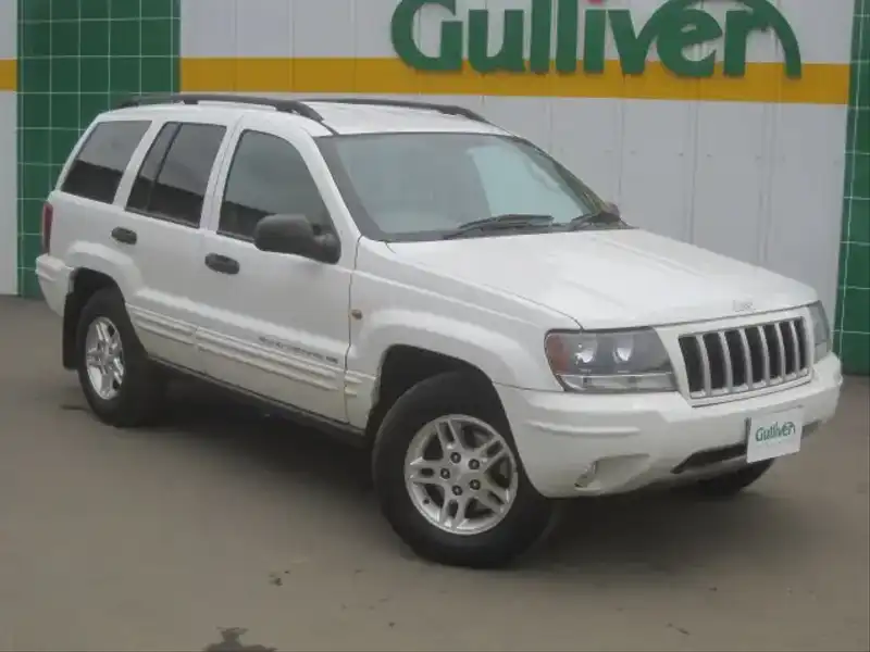 カタログ画像：ジープ・グランドチェロキー（JEEP GRAND CHEROKEE） ラレード 2003年6月 GH-WJ40 4000cc ストーンホワイトクリアコート 燃費6.5km / l  メイン