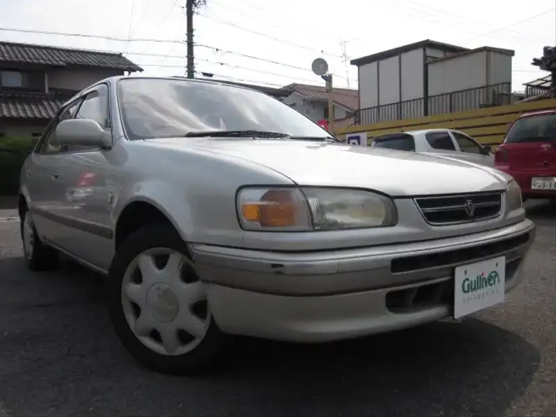 カタログ画像：カローラ（COROLLA） ＳＥサルーン Ｇパッケージ ３０周年記念車 1996年9月 E-AE110 1500cc ウォームグレーパールメタリック 燃費14.6km / l  メイン