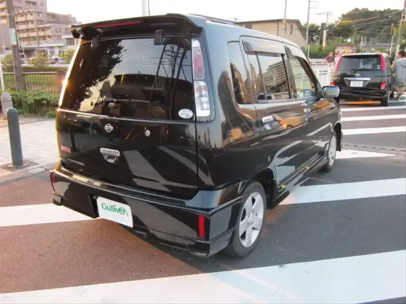 カタログ画像：キューブ（CUBE） ライダー ハイパーＣＶＴ－Ｍ６ 2000年9月 TA-ANZ10 1300cc スーパーブラック 燃費14.6km / l  バック