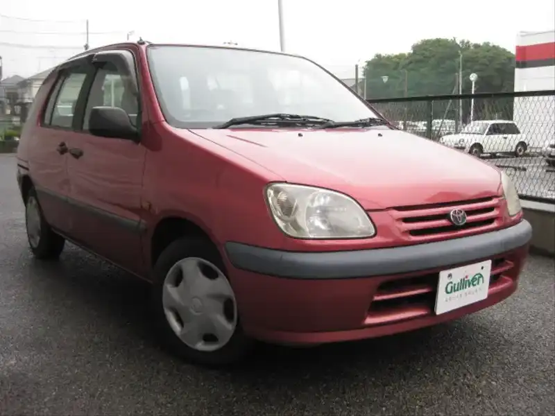 カタログ画像：ラウム（RAUM） レッドエディション Ｇパッケージ 1997年8月 E-EXZ10 1500cc スーパーレッドⅡ 燃費13.8km / l  メイン