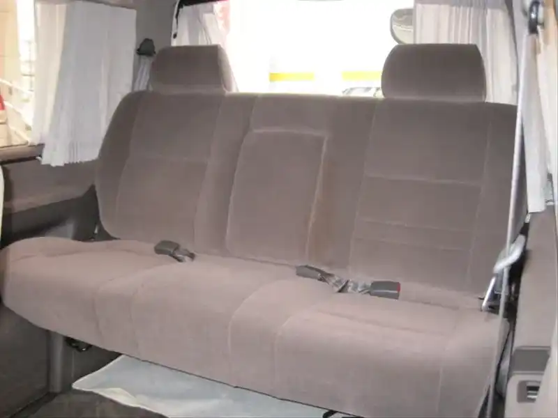 カタログ画像：ハイエースワゴン（HIACE WAGON） リビングサルーンＥＸ 電動カーテン付 2004年4月 KH-KZH100G 3000cc スプリームパールトーニングII 燃費9.5km / l  内装