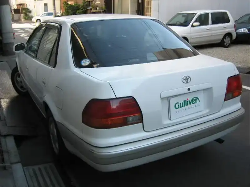 カタログ画像：カローラ（COROLLA） ＳＥサルーン 1996年5月 KD-CE110 2000cc スーパーホワイトII バック