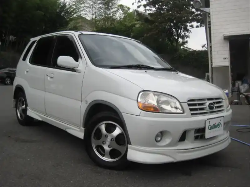 カタログ画像：スイフト（SWIFT） ２１世紀記念スペシャルＳＧエアロⅡ 2001年4月 LA-HT51S 1300cc パールホワイト 燃費16.4km / l  メイン