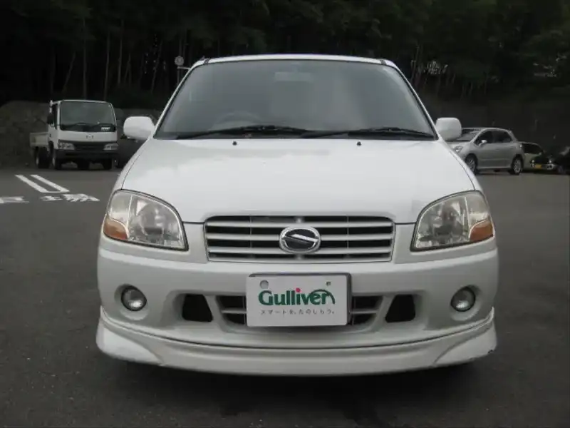 カタログ画像：スイフト（SWIFT） ２１世紀記念スペシャルＳＧエアロⅡ 2001年4月 LA-HT51S 1300cc パールホワイト 燃費16.4km / l  フロント